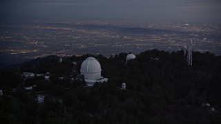 5K aerial stock footage orbiting around the Mount Wilson Observatory at twilight, California Aerial Stock Footage | AX0008_055