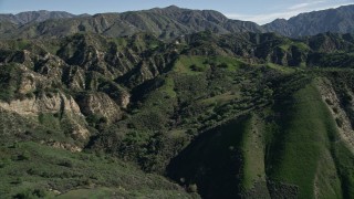 5K aerial stock footage fly over the San Gabriel Mountains in California toward power lines Aerial Stock Footage | AX0009_001E