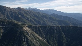 5K aerial stock footage approach road on a mountain ridge in the San Gabriel Mountains, California Aerial Stock Footage | AX0009_036