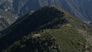 5K aerial stock footage of flying over a mountain ridge in the San Gabriel Mountains, California Aerial Stock Footage | AX0009_047E