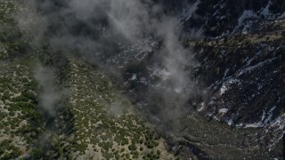 5K aerial stock footage bird's eye view of snow in steep canyon in the San Jacinto Mountains, California Aerial Stock Footage | AX0010_069