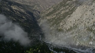 5K aerial stock footage orbit a canyon with light winter snow in the San Jacinto Mountains, California Aerial Stock Footage | AX0010_097