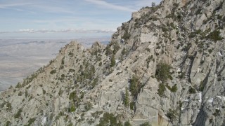 5K aerial stock footage fly over mountain slopes with small patches of snow in the San Jacinto Mountains, California Aerial Stock Footage | AX0010_098E