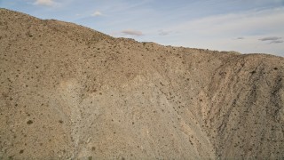 5K aerial stock footage approach top of desert mountain ridge in Joshua Tree National Park, California Aerial Stock Footage | AX0011_022