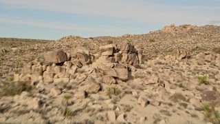 AX0011_034 - 5K aerial stock footage fly over Joshua Trees, Joshua Tree National Park, California