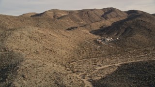 5K aerial stock footage of isolated buildings in the desert, Joshua Tree National Park, California Aerial Stock Footage | AX0011_046