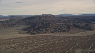 5K aerial stock footage of desert mountains and plains, Mojave Desert, California Aerial Stock Footage | AX0011_062