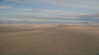 AX0011_066 - 5K aerial stock footage of the wide expanse of the Mojave Desert in California