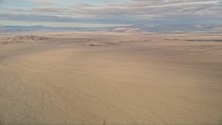 5K aerial stock footage of desert plains and mountains, Mojave Desert, California Aerial Stock Footage | AX0011_069