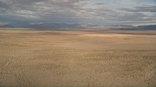 5K aerial stock footage of an open plain in the Mojave Desert, California Aerial Stock Footage | AX0011_071E