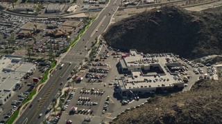 AX0013_056 - 5K aerial stock footage bird's eye of an Enterprise Rent-A-Car office, Cathedral City, California