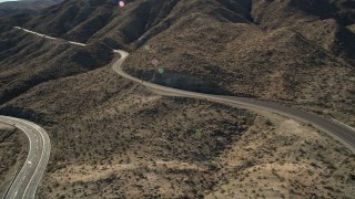 5K aerial stock footage approach a highway through San Jacinto Mountains, California Aerial Stock Footage | AX0014_003