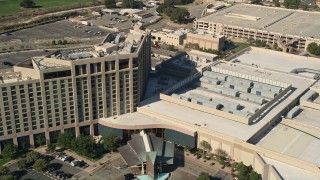 AX0014_048 - 5K aerial stock footage tilt from residential neighborhoods and approach Pechanga Resort and Casino, Temecula, California