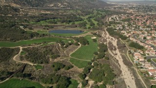 5K aerial stock footage of flying over a golf course, Temecula, California Aerial Stock Footage | AX0014_050