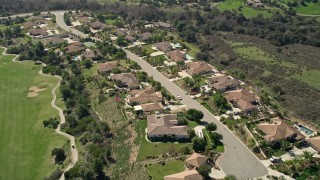 AX0015_027 - 5K aerial stock footage fly over small residential neighborhood, Fallbrook, California