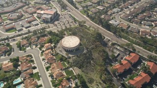 5K aerial stock footage of a circular building in a residential community, Oceanside, California Aerial Stock Footage | AX0015_047