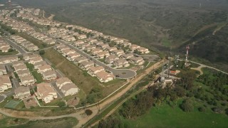 5K aerial stock footage flyby tract homes in a residential neighborhood, Oceanside, California Aerial Stock Footage | AX0015_057