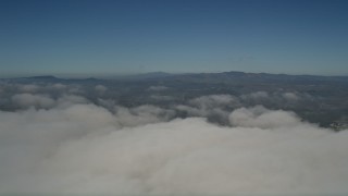 5K aerial stock footage pan across the top of the clouds to reveal the edge of the layer, Oceanside, California Aerial Stock Footage | AX0016_013