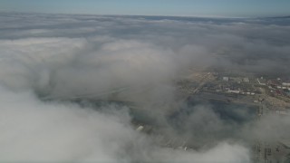 5K aerial stock footage flyby clouds to reveal Camp Pendleton, California Aerial Stock Footage | AX0016_016