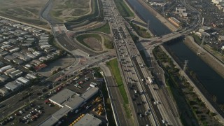 5K aerial stock footage of following heavy traffic on Interstate 405 and tilt up, Carson, California Aerial Stock Footage | AX0017_023