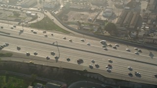 5K aerial stock footage of cars on Interstate 110, South Central Los Angeles Aerial Stock Footage | AX0017_037E