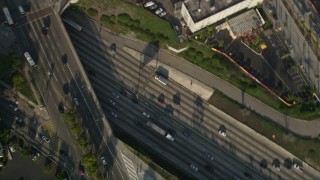 AX0017_059 - 5K aerial stock footage bird's eye circling city street and interstate traffic, University Park, California