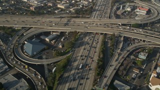 5K aerial stock footage of following Interstate 110 over the 10 interchange, Downtown Los Angeles Aerial Stock Footage | AX0017_060