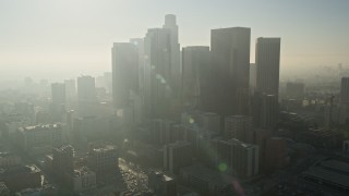 AX0017_067 - 5K aerial stock footage tilt up revealing City Hall and skyscrapers, Downtown Los Angeles