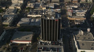 5K aerial stock footage approach and tilt down on CNN building, Hollywood, California Aerial Stock Footage | AX0017_083