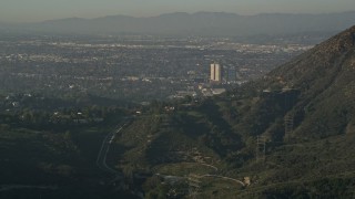 AX0017_087 - 5K aerial stock footage of Warner Brothers Studio from Hollywood Hills, Burbank, California