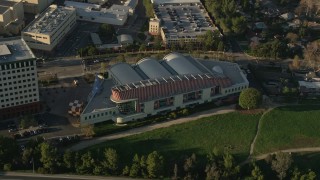 5K aerial stock footage of Walt Disney Company studios tilt down on animation building, Burbank, California Aerial Stock Footage | AX0017_106