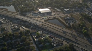 5K aerial stock footage of light traffic on Highway 50 in Orlando at sunrise, Florida Aerial Stock Footage | AX0018_025