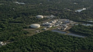 5K aerial stock footage of a water treatment plant in Melbourne, Florida at sunrise Aerial Stock Footage | AX0018_063