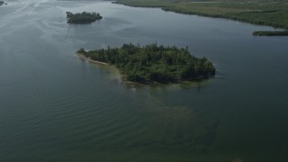 AX0018_089 - 5K aerial stock footage of approaching mangroves in the Indian River, Florida