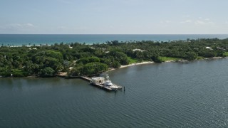 5K aerial stock footage of docked fishing boat on the Indian River by Hobe Sound, Florida Aerial Stock Footage | AX0019_023