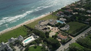 5K aerial stock footage of a spacious oceanfront mansion in Palm Beach, Florida Aerial Stock Footage | AX0019_056