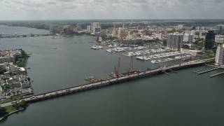 AX0019_058E - 5K aerial stock footage approach Flagler Memorial Bridge on Lake Worth in Palm Beach, Florida