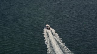 5K aerial stock footage of tracking a speedboat cruising across Biscayne Bay, Florida Aerial Stock Footage | AX0020_006E