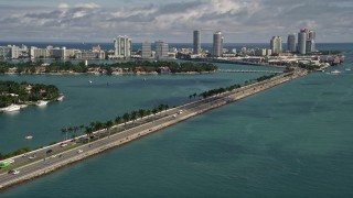 AX0020_037 - 5K aerial stock footage tilt from light traffic on MacArthur Causeway to reveal South Beach, Florida