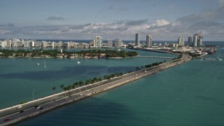 AX0020_038 - 5K aerial stock footage of light traffic on the MacArthur Causeway heading to and from South Beach, Florida