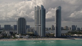 5K aerial stock footage of luxury resort hotels on the beach in Sunny Isles Beach, Florida Aerial Stock Footage | AX0020_079E