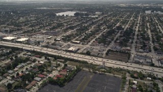 5K aerial stock footage of light traffic on Interstate 95 through Miami Shores, Florida Aerial Stock Footage | AX0020_107