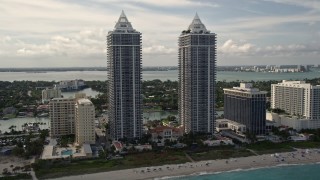 5K aerial stock footage approach oceanfront skyscrapers in Miami Beach, Florida Aerial Stock Footage | AX0021_047