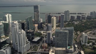 5K aerial stock footage of Downtown Miami skyscrapers around the Four Seasons Hotel high-rise, Florida Aerial Stock Footage | AX0021_082E