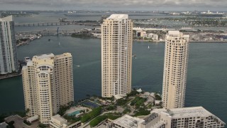 5K aerial stock footage of waterfront skyscrapers on the shore of Brickell Key, Downtown Miami, Florida Aerial Stock Footage | AX0021_122