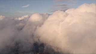 5K aerial stock footage approach cloud formation over Miami at sunset, Florida Aerial Stock Footage | AX0022_015