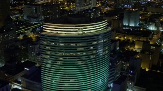 5K aerial stock footage of Miami Tower in Downtown Miami at night, Florida Aerial Stock Footage | AX0023_022