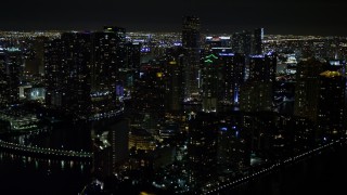 5K aerial stock footage flyby Brickell Key high-rises at night in Downtown Miami, Florida Aerial Stock Footage | AX0023_055E