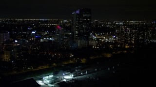 5K aerial stock footage of beachfront hotel at night in Miami Beach, Florida Aerial Stock Footage | AX0023_079E