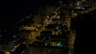 5K aerial stock footage fly over Indian Creek Drive through Miami Beach at night, Florida Aerial Stock Footage | AX0023_102E